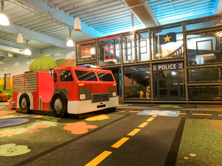 Wooden cross in a green field