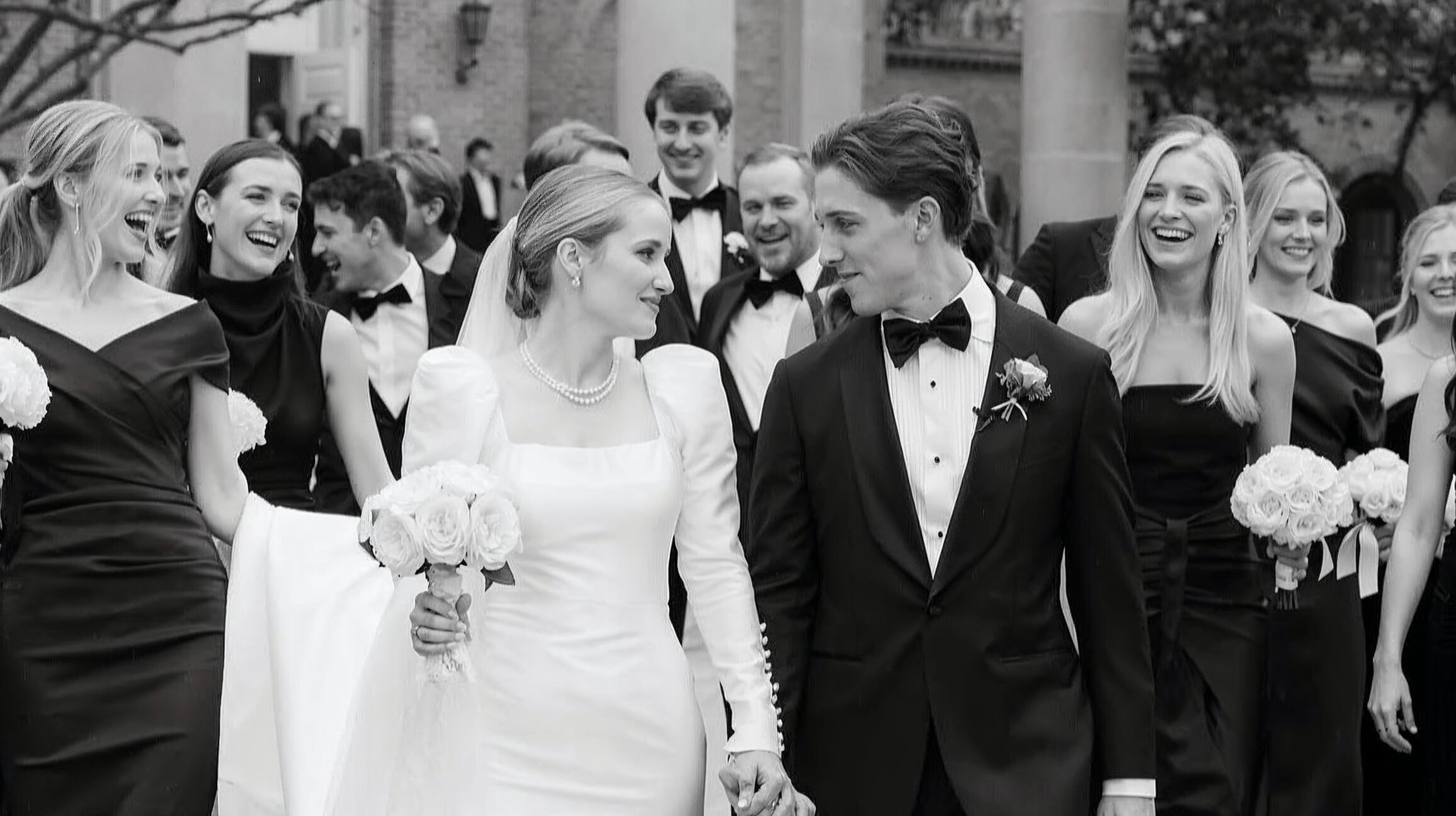 Man and woman getting married with a crowd